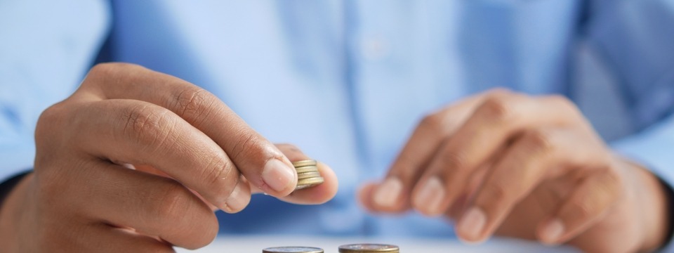Man counting coins